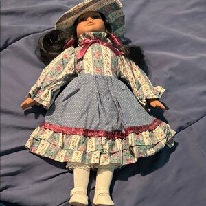 Charming Floral Porcelain Doll with Blue Dress and Hat